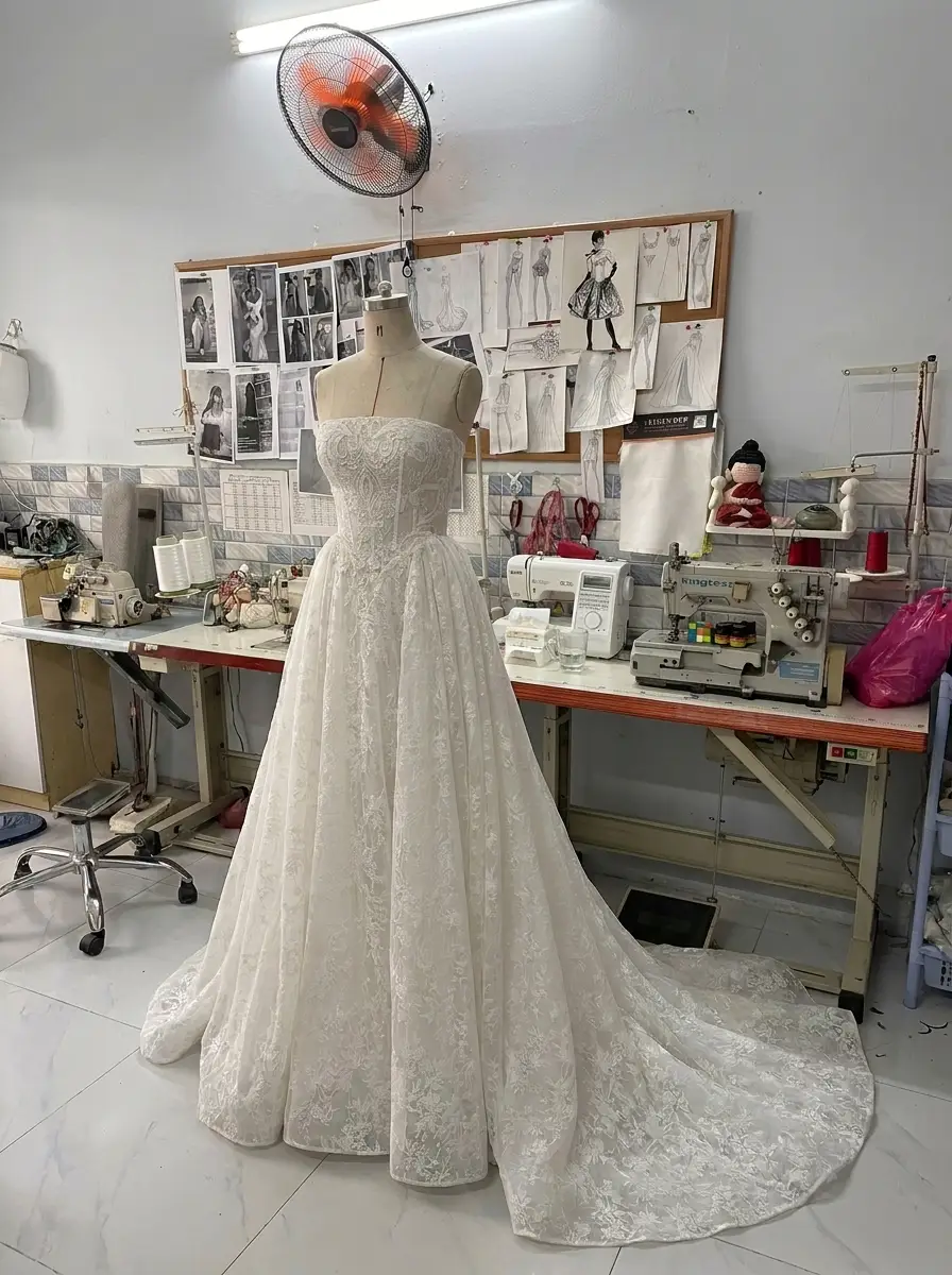A-line wedding dress silhouette with fitted bodice and softly widening skirt, custom-made by VI Dressmakers Vietnam