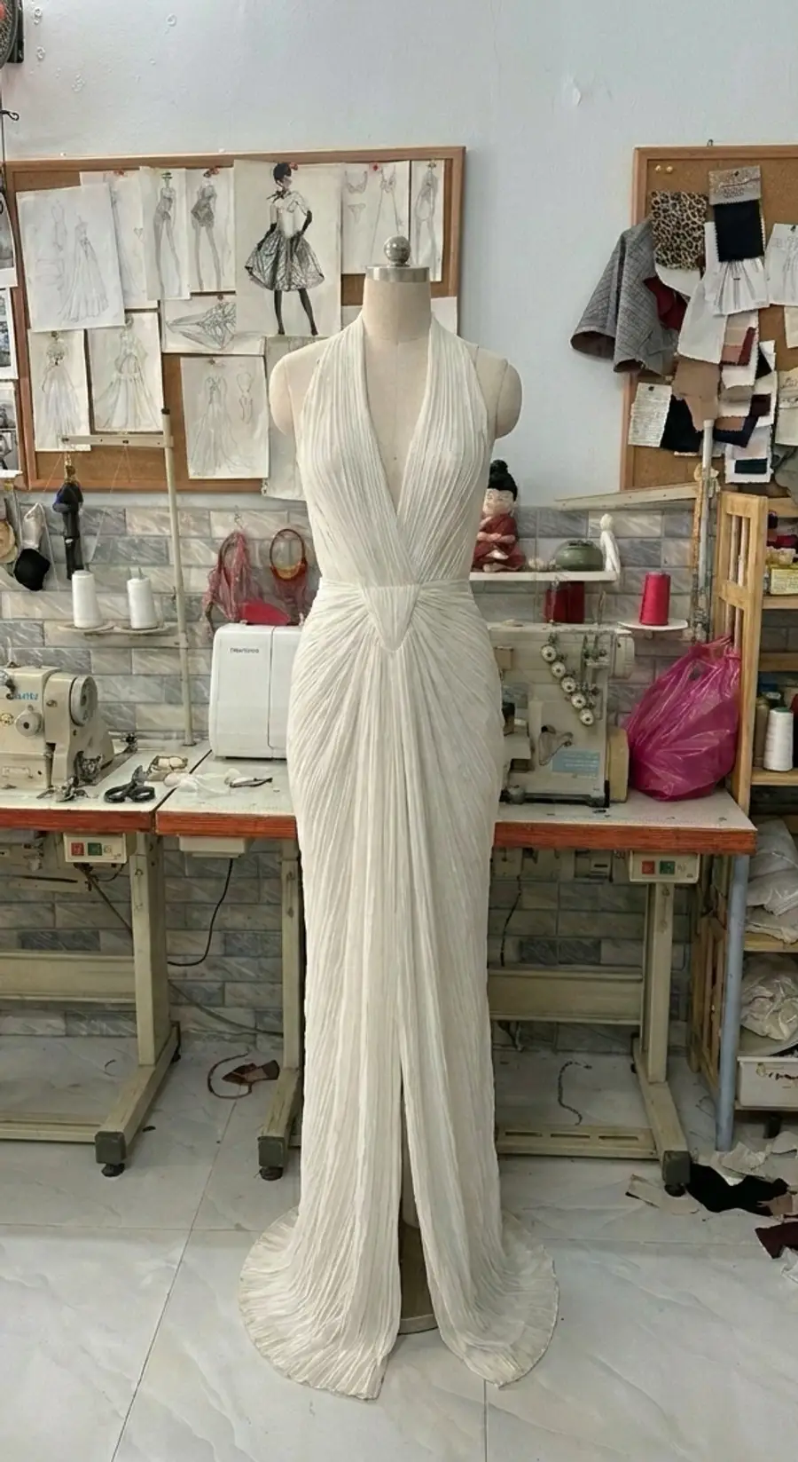 Draped bridal fabric for a custom wedding dress fabric guide showing movement and light